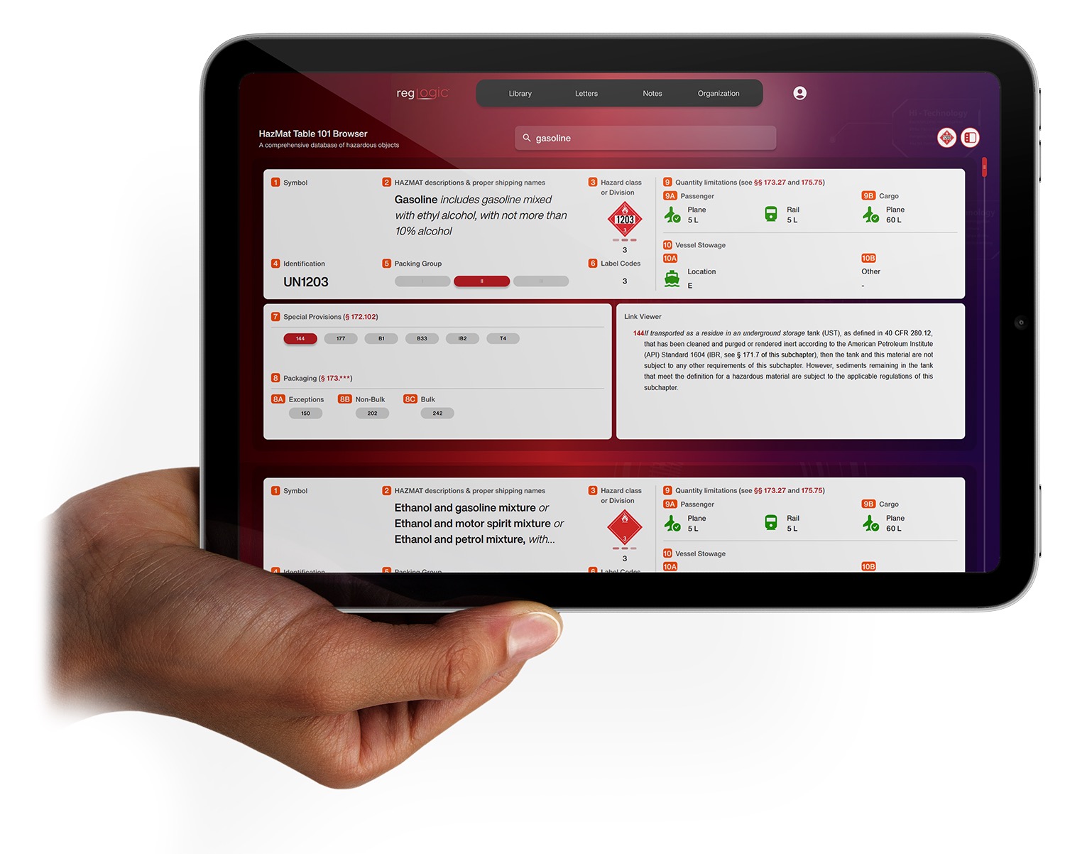 Hand holding tablet displaying RegLogic application at an oil and gas site